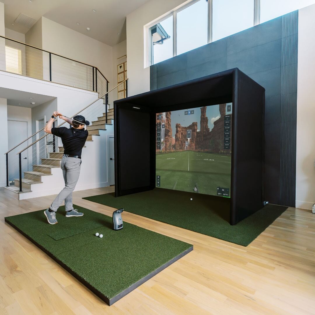 SIGPRO Commercial Golf Simulator enclosure with golf simulator and golf mat