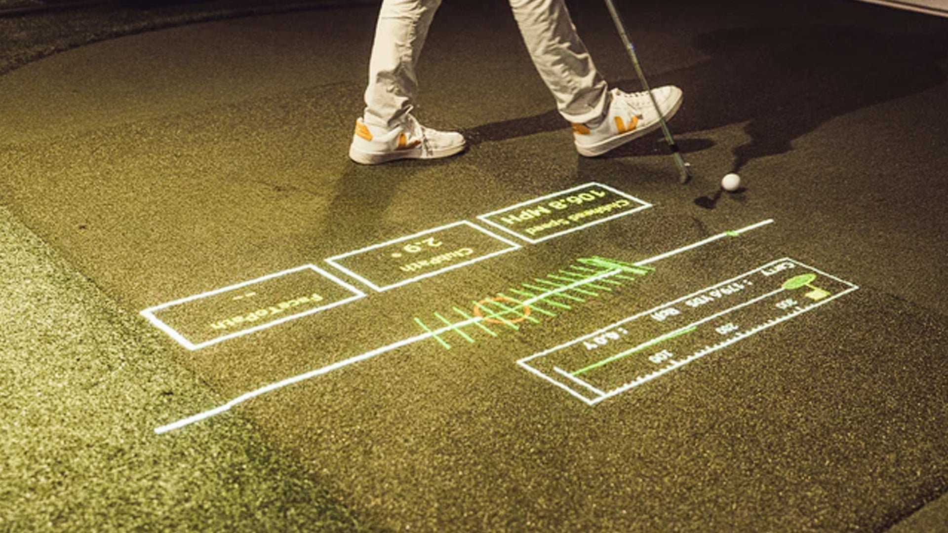 A man standing over and interacting with the Foresight FOCUS interface