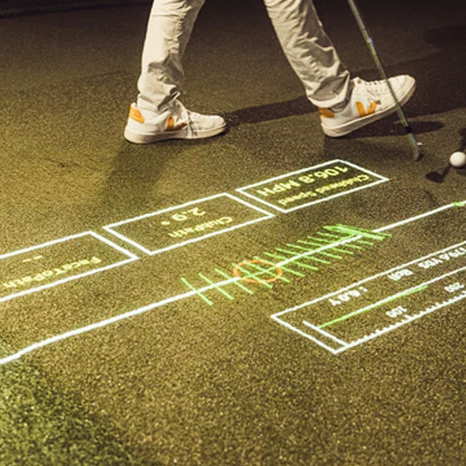 A man standing over and interacting with the Foresight FOCUS interface