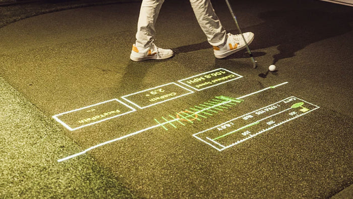 A man standing over and interacting with the Foresight FOCUS interface