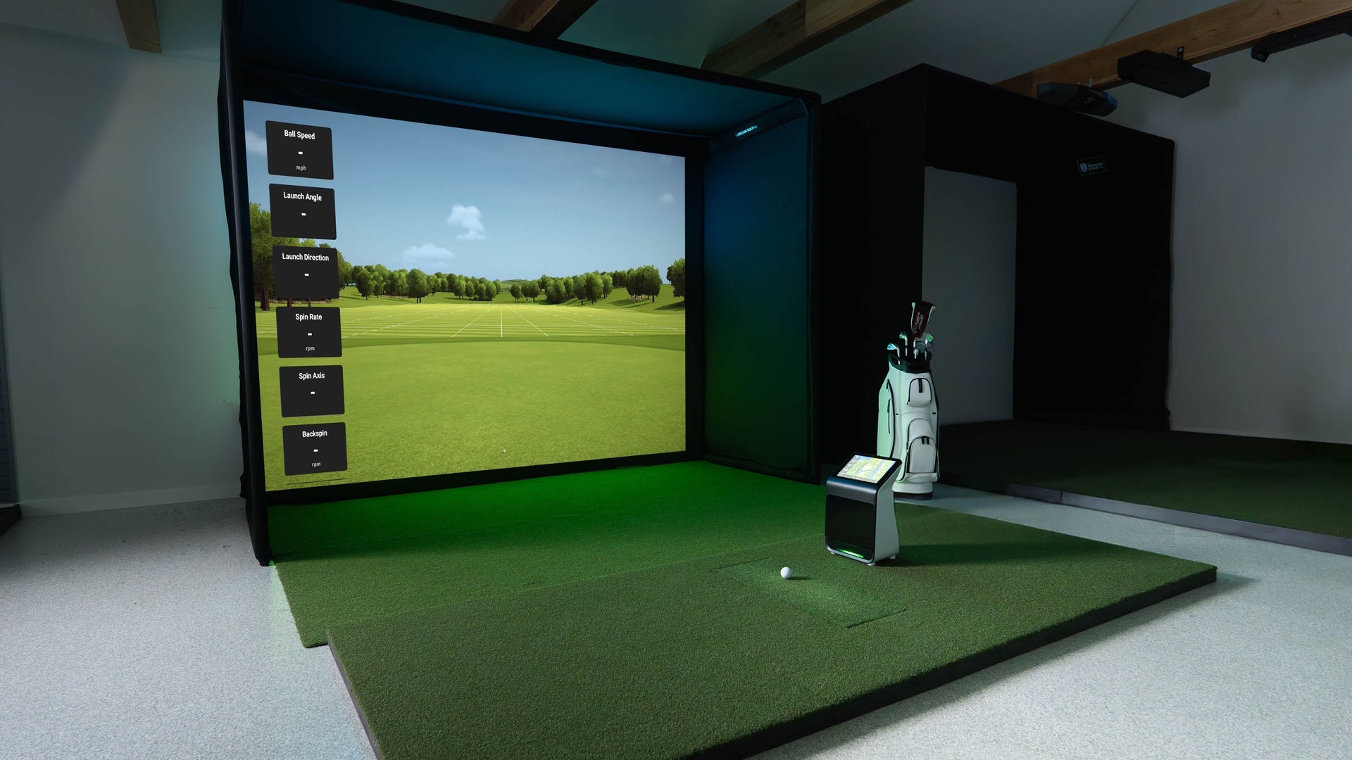 Square golf launch monitor on turf.