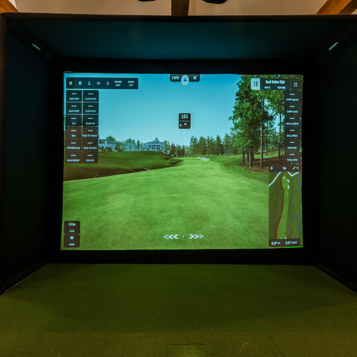 Square golf launch monitor on turf.