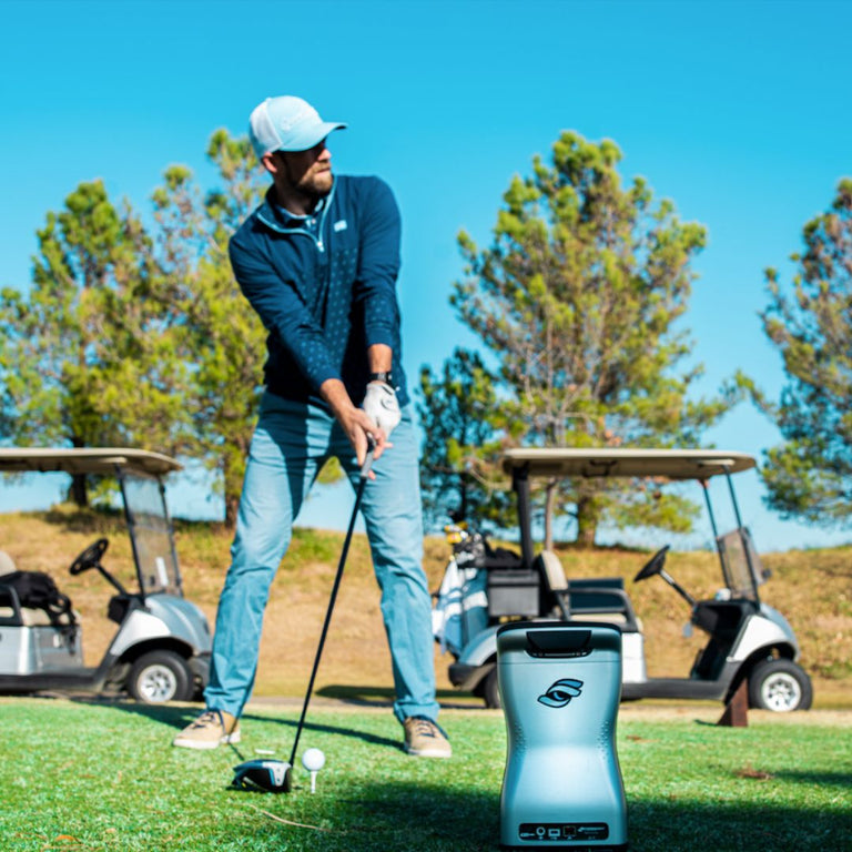 foresight gcquad launch monitor being used on the golf course by golfer