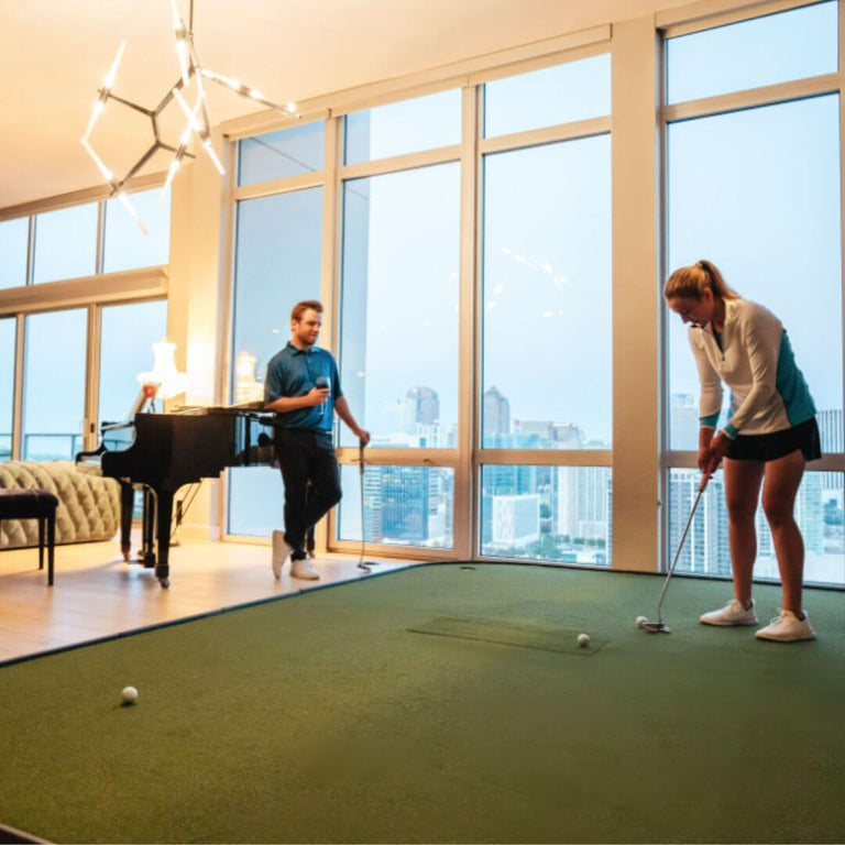SIGPRO Golf Simulator Flooring with two golfers putting on surface.