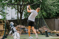 Training Golf Simulator Package outdoors with golfer