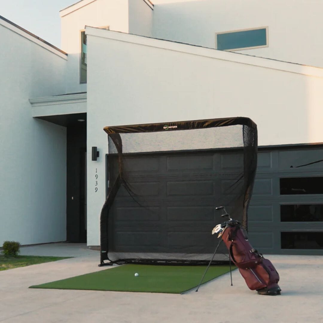 net return outdoors with golf bag