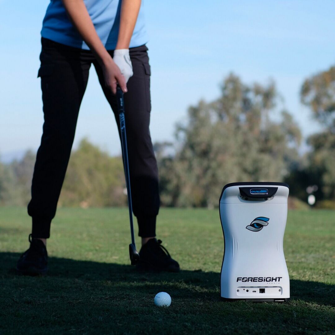 foresight sports quad max launch monitor being used outdoors on a driving range