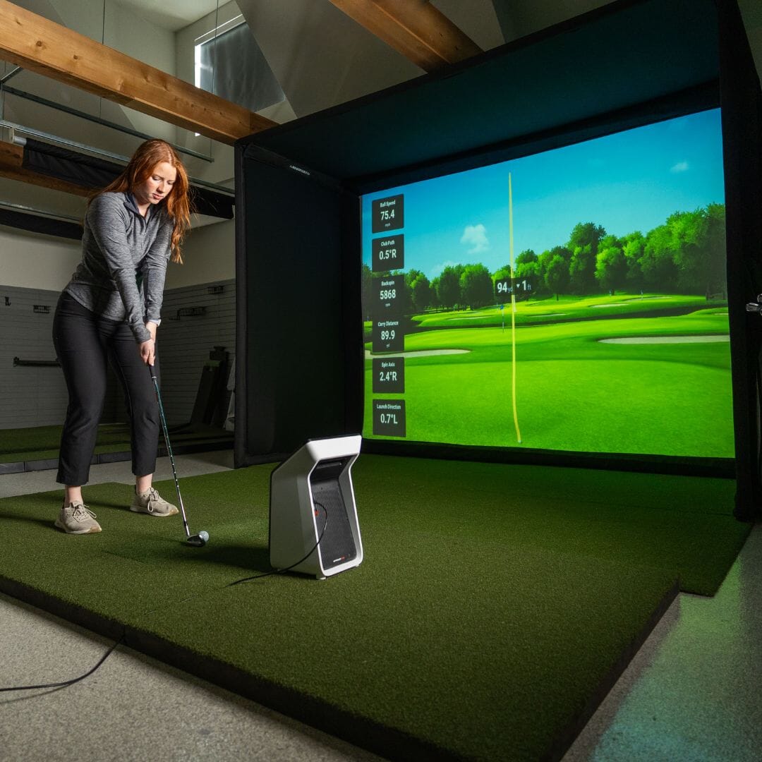 Garmin Approach R50 golfer on SIG10 golf simulator package