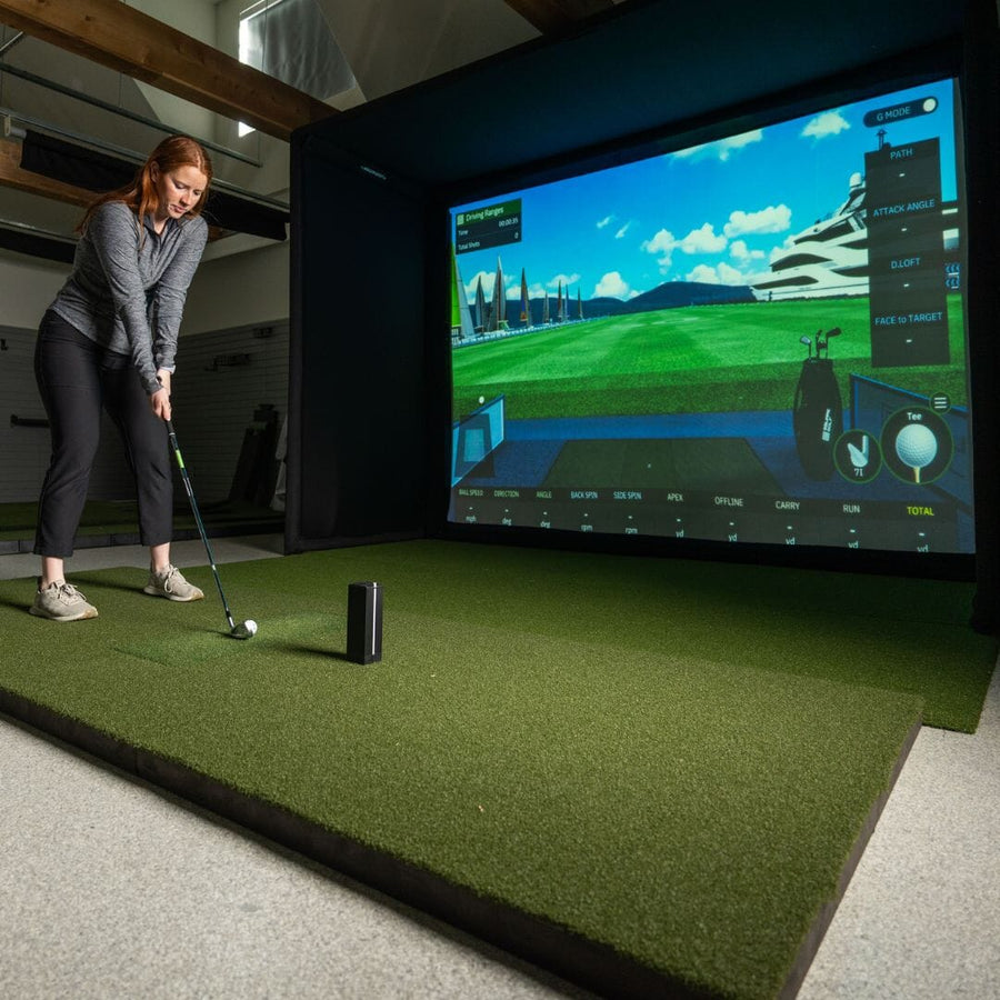 Square Golf launch monitor in an indoor simulator setup
