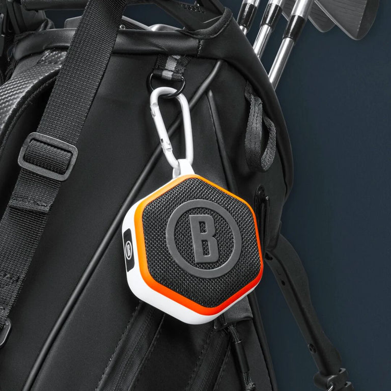Wingman MINI GPS Speaker clipped to golf bag